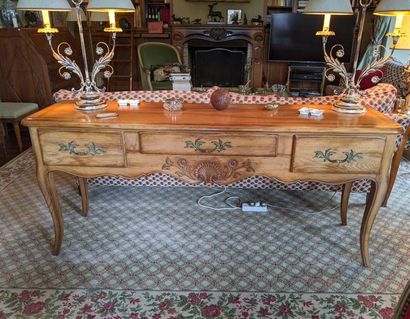 null CONSOLE TABLE in light oak opening with three drawers in belt, the apron carved...
