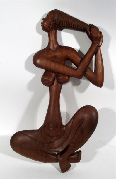 null RALMEIDA (XXème)
"Femme accroupi se lissant les cheveux"
Sculpture en bois signée.
Hauteur...