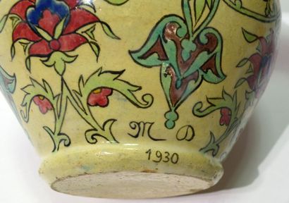 null Ceramic VASE with ovoid body and polychrome floral decoration. 
Has an illegible...