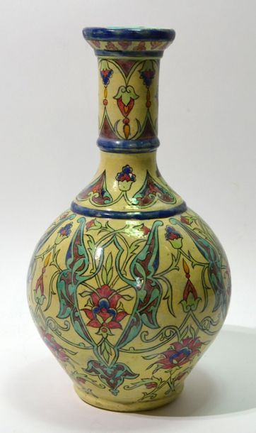null Ceramic VASE with ovoid body and polychrome floral decoration. 
Has an illegible...