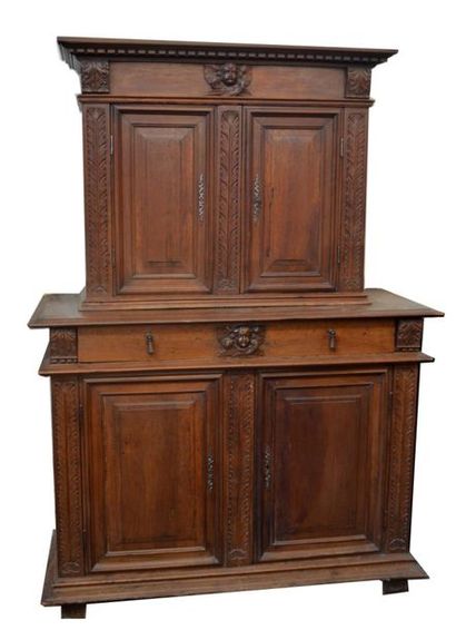 null Sideboard with two recessed carved and moulded oak bodies, the upper part opening...