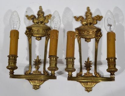 null Pair of ormolu and chiselled bronze sconces with two light arms decorated with...