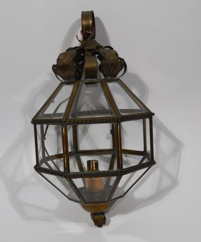 null LANTERN of octagonal shape with openwork panes of glass, the top decorated with...