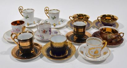 null 11 cups and saucers in mismatched porcelain including Charles AHRENFELD in LIMOGES...