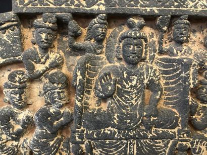 null BUDDHIC STEL in sculpted schist showing a Boddhisatva surrounded by worshippers...