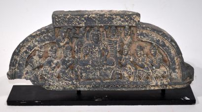 null BUDDHIC STEL in sculpted schist showing a Boddhisatva surrounded by worshippers...