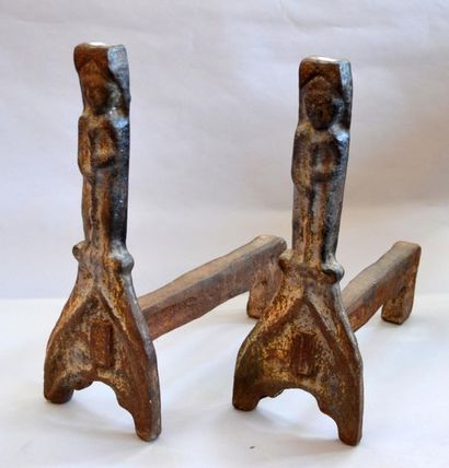 null Pair of cast iron CHENETS representing wild men with clubs and a hug.
Work probably...