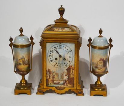 null GARNITURE DE CHEMINEE including a gilded bronze bollard clock and a painted...