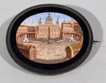 null Oval spindle on onyx plate set with a micro-mosaic plate depicting the church...