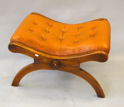 null Rocking chair in leather upholstered in Victorian style with toe.