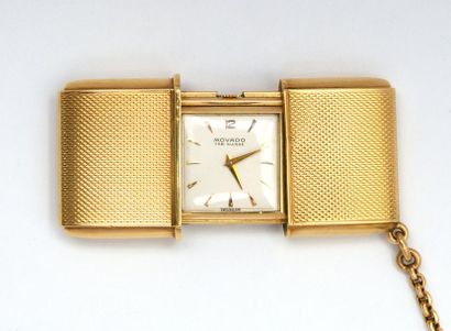 null MOVADO - ERMETO Model - circa 1950
Rectangular bag watch in 18 K (750/oo) yellow...