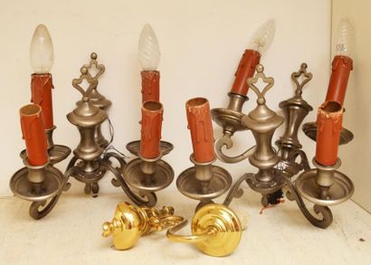 null Set of four two-armed pewter sconces
Modern work.
A brass sconce is attache...