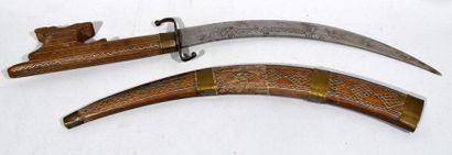 null Lot including: 
- Kinjal (Caucasus)
Dagger with handle enhanced with finely...