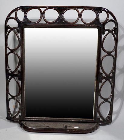 null MIRROR in enamelled cast iron with openwork decoration. With shelf.
61,5 x 57,5...