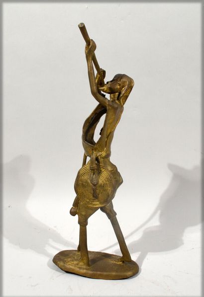 null AFRIQUE, XXème siècle

"Homme à la flûte"

Bronze à la cire perdue à patine...