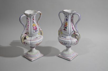 null PAIR OF VASES with handles in white glazed earthenware with polychrome decoration...