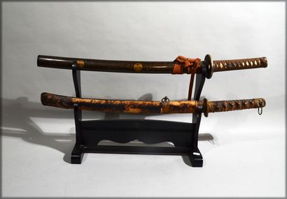 null Meeting of two JAPANESE SABRES called "Wakizashi":

- The first one with a blade...
