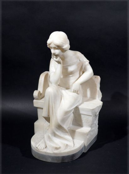 null Carved white Carrara marble group showing a woman reflecting on a bench

Art...