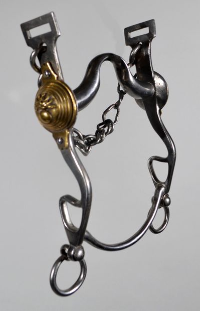 null Wrought iron gendarmerie officer's bridle bit. The smooth brass bosses appearing...