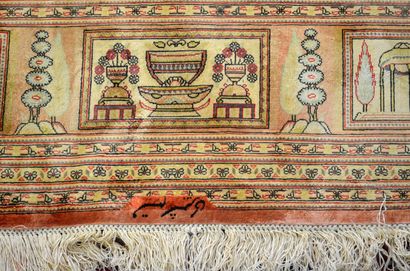 null IRAN, Ghoum

Important hand-knotted silk RUG decorated with temples, vases in...