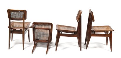 null GUBI - Suite of four chairs model "C-Chair" of dining room in oiled oak, with...