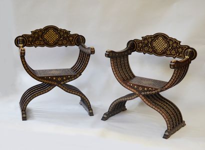 null Pair of wooden armchairs inlaid with bone plates, with geometrical and floral...