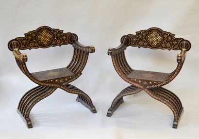 null Pair of wooden armchairs inlaid with bone plates, with geometrical and floral...