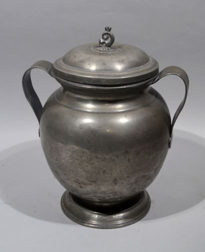 null BESANCON. 

Pewter butter pot of baluster shape with a moving pedestal, two...