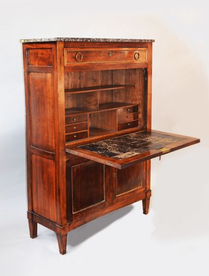 null A mahogany and mahogany veneer SECRETARY. It opens with a drawer in the upper...