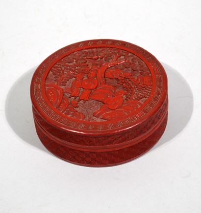 null Circular, carved red lacquer covered box, decorated with sages in discussion...