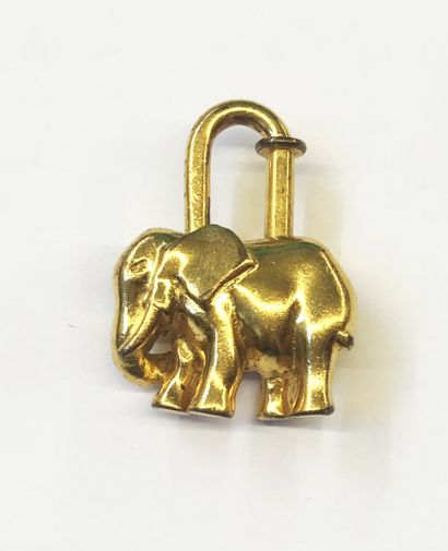null HERMES Paris Made in France

Gold-plated metal padlock featuring an elephant....