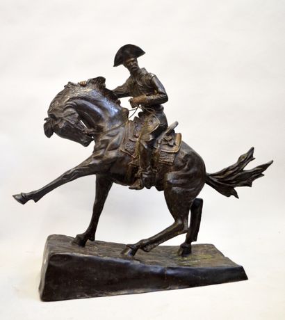 null Frédéric REMINGTON (1861-1909)

"Cowboy"

Epreuve en bronze à patine brune et...