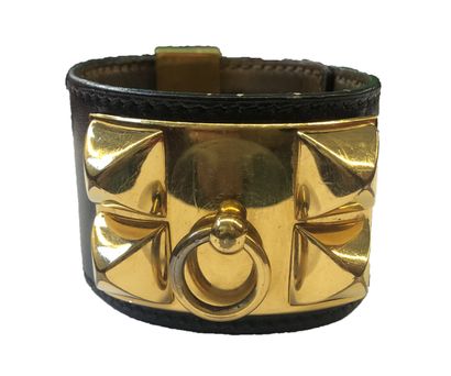 null HERMES Paris made in France

Cuff bracelet "Collier de Chien" in black calfskin,...
