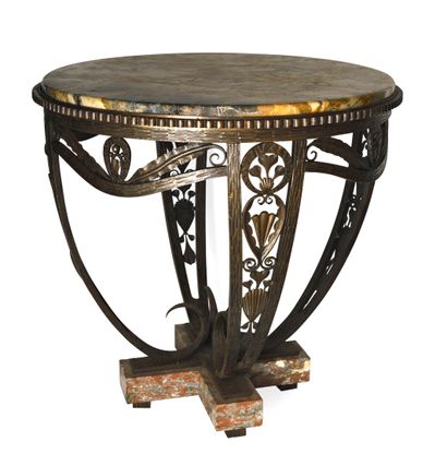 null In the taste of Edgar BRANDT

Wrought iron pedestal table with a patina and...