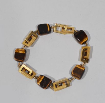 null BRACELET in 18 K (750/oo) yellow gold with double square links alternating with...