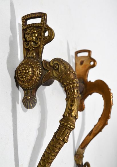 null Officer's bridle bit, in chased and gilded bronze. The bronze bosses are decorated...