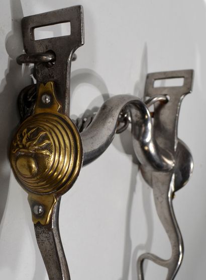 null Wrought iron gendarmerie officer's bridle bit. The smooth brass bosses appearing...