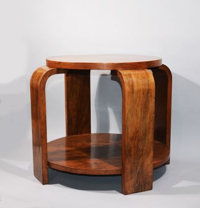 null Louis Sognot (1892 - 1970) In the taste of 

A walnut veneered pedestal table...