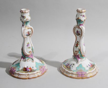 null MEISSEN

Pair of porcelain candlesticks with polychrome decoration of animated...