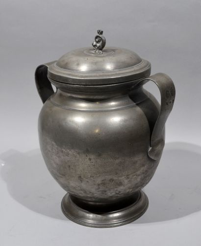 null BESANCON. 

Pewter butter pot of baluster shape with a moving pedestal, two...