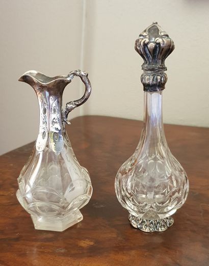 null Meeting of two crystal SALT JUGS with silver (925/oo) finely chased mountings

19th...
