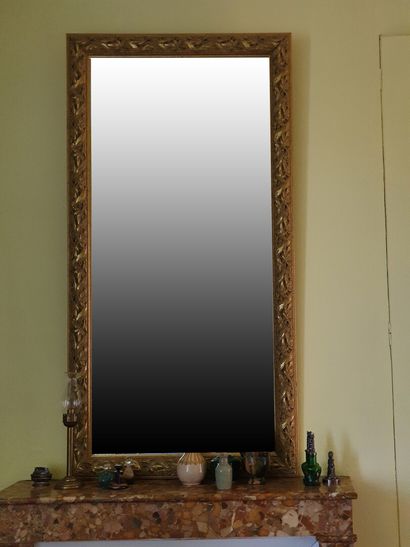 null Important bevelled CHIMNEY MIRROR with gilded and stuccoed wood frame decorated...