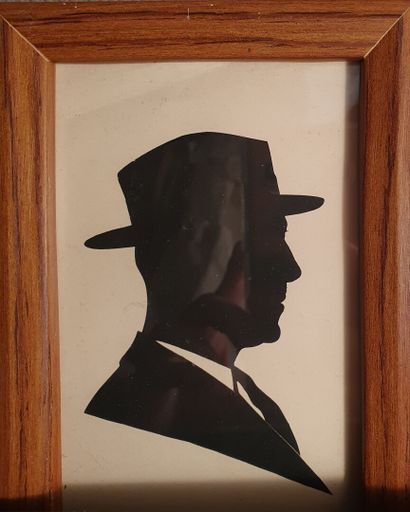 null Meeting of two PAPER CUT-outs showing a profile of a man with a hat and a woman...