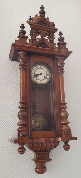 null Moulded and turned oak wall clock, the uprights with open columns topped by...