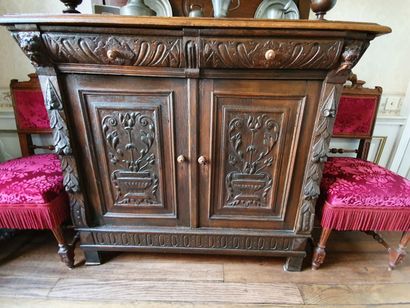 null Two bodies of molded and carved oak Dishes and Buffet - The upper part opening...