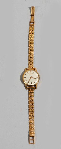 null TISSOT - Ladies' wristwatch in 18 K (750/oo) yellow gold, the round dial with...