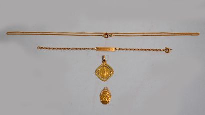 null Réunion de bijoux en or jaune 18 K (750/oo) comprenant une chaîne à maille gourmette,...