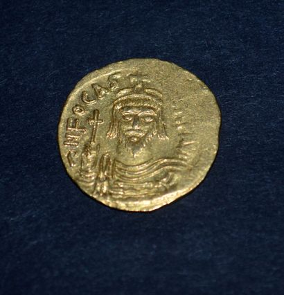 null Magnificent coin of Phocas in yellow gold 24 K (100/oo)

Obverse : Description...