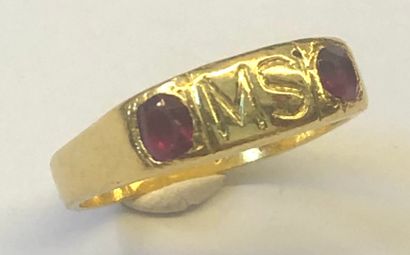 null 18K (750/1000th) yellow gold ring set with two red stones, probably rubies,...