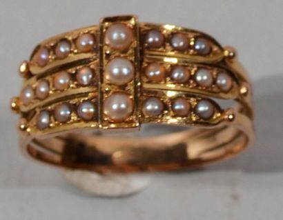 null BAGUE en or rose 18K (750/1000e) sertie de perles probablement fines sur trois...